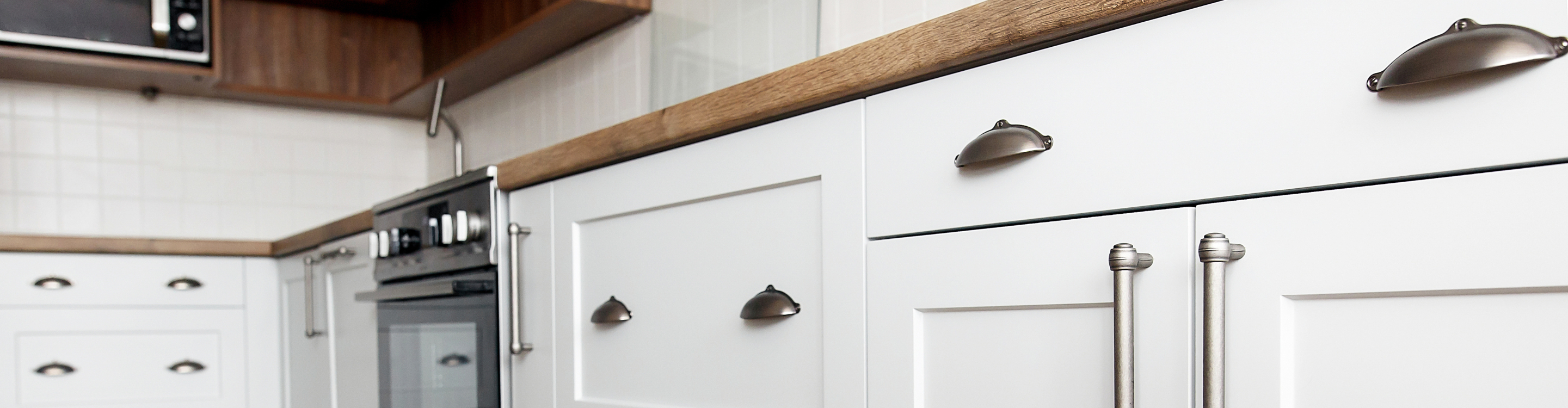 white cabinets with metal hardware